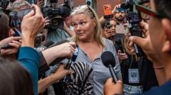Woman charged with juror intimidation in Lindsay Clancy trial